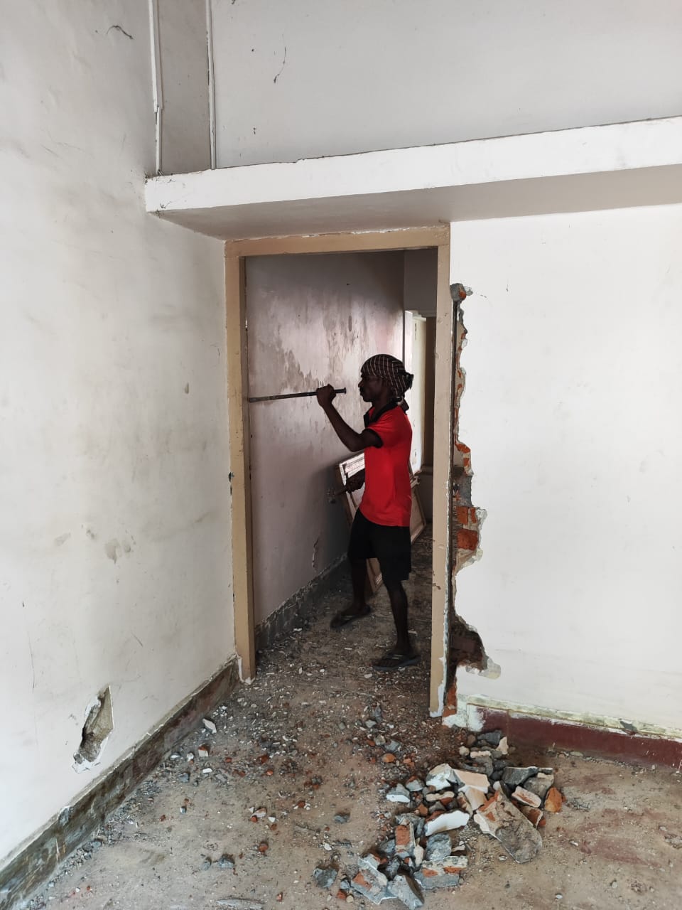 Truck with crane transporting portable site office